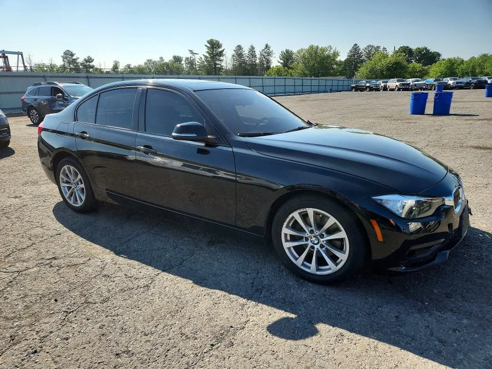 WBA8E5G53GNU21420 — 2016 BMW 320 photo 4