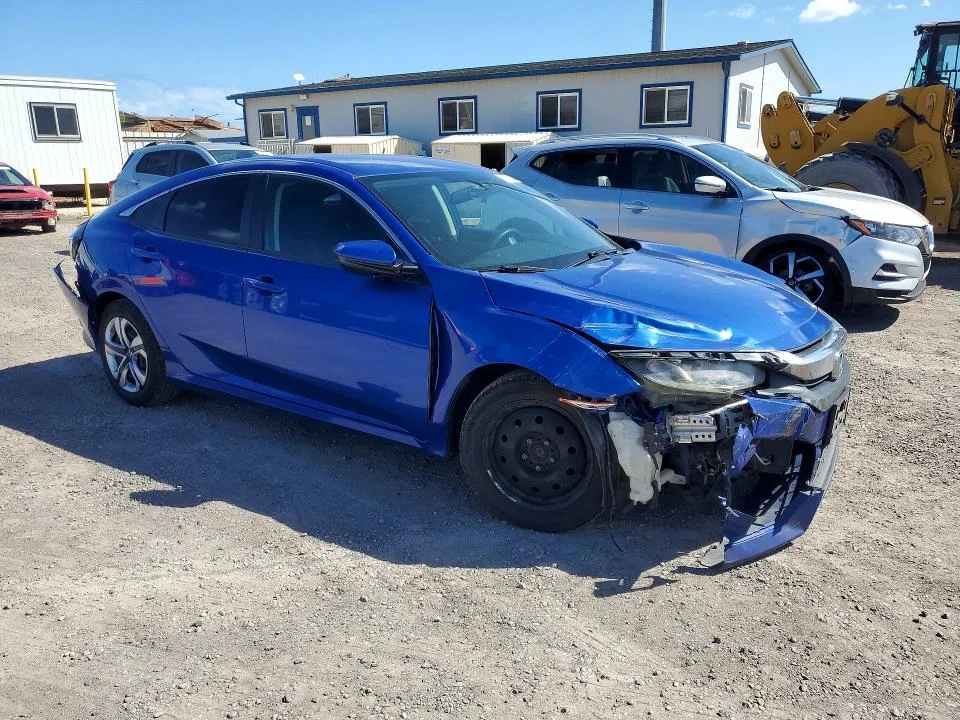 2HGFC2F53JH607637 — 2018 HONDA CIVIC photo 4