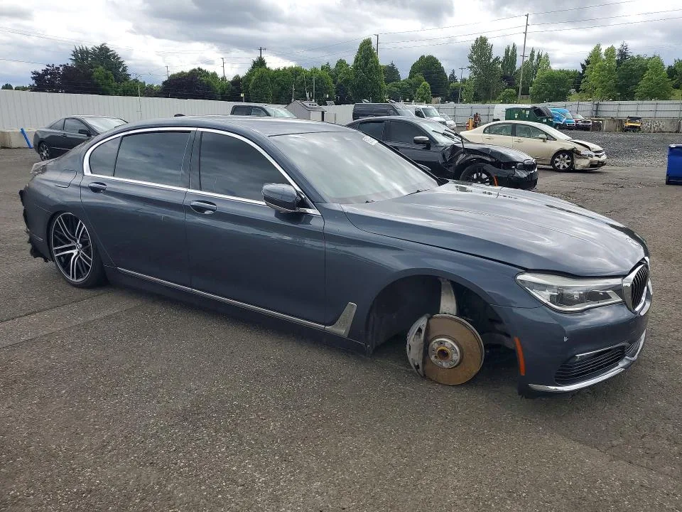 WBA7F0C54GGL99417 — 2016 BMW 750 photo 4