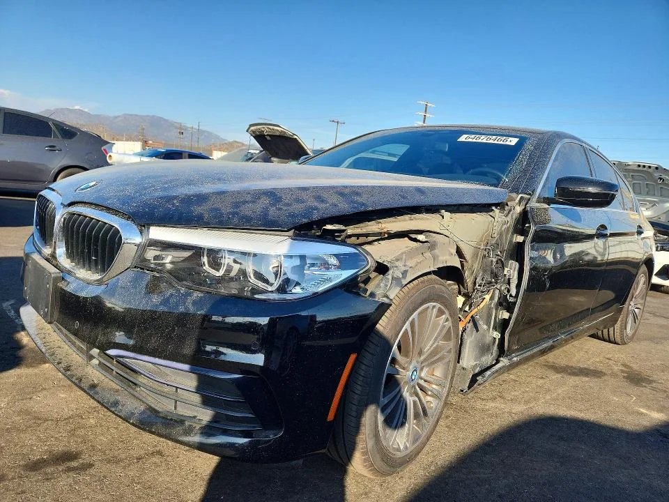 WBAJA9C59KB254131 — 2019 BMW 530E photo 1