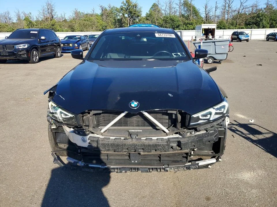 3MW89FF03P8D05881 — 2023 BMW 330XI photo 5