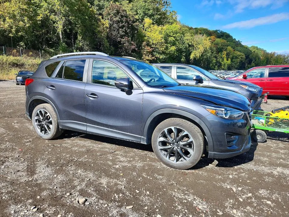 JM3KE4DY9G0705799 — 2016 MAZDA CX-5 photo 4