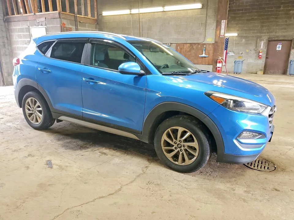 KM8J3CA40JU703795 — 2018 HYUNDAI TUCSON photo 4