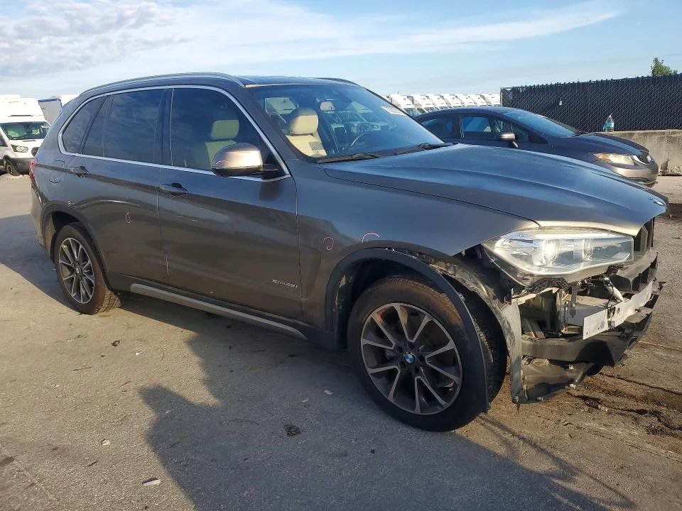 5UXKR0C57J0X98132 — 2018 BMW X5 photo 4