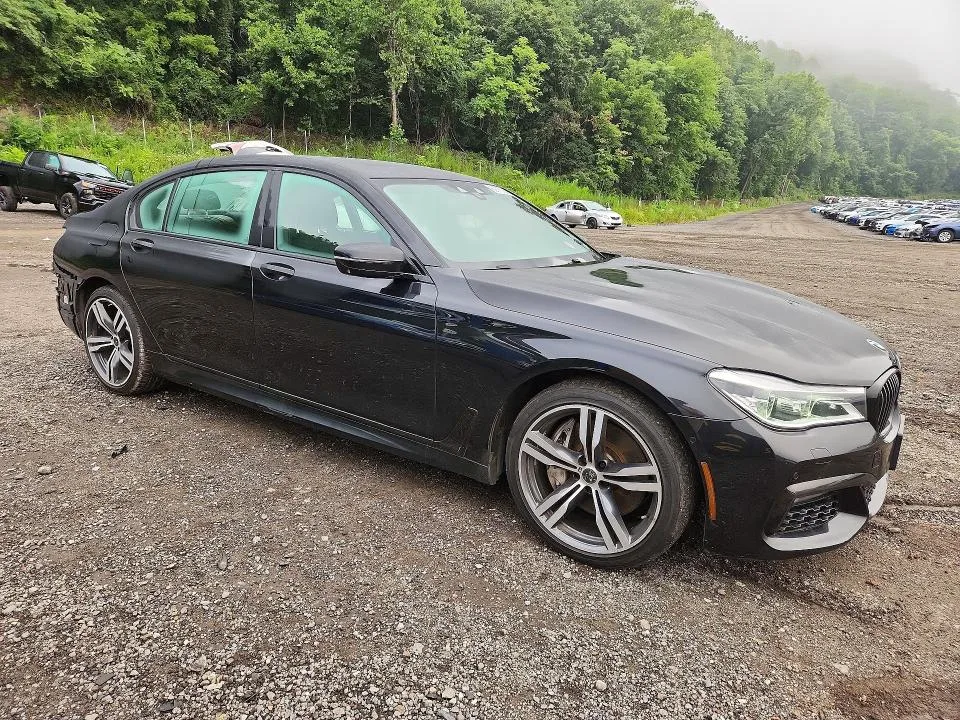WBA7F2C33HG423265 — 2017 BMW 750 photo 4