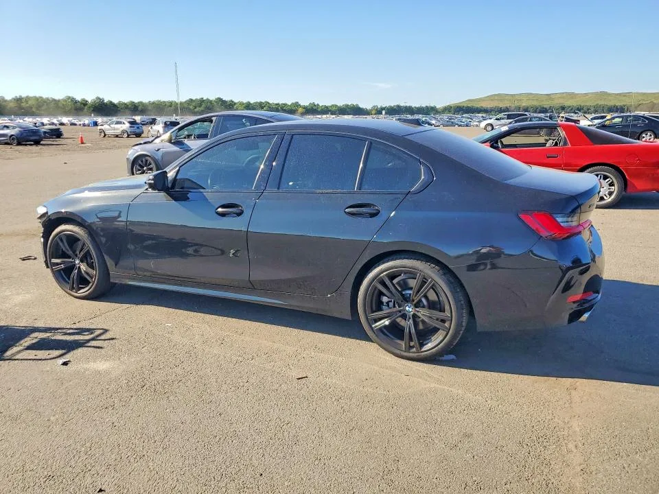3MW89FF03P8D05881 — 2023 BMW 330XI photo 2