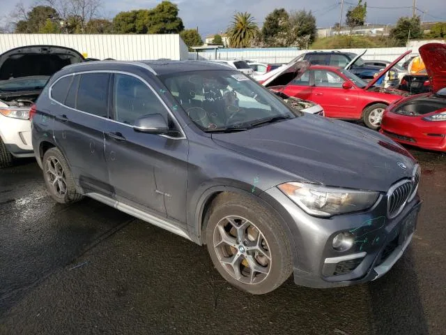 WBXHU7C39J5H43384 — 2018 BMW X1 photo 4