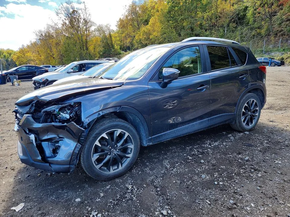 JM3KE4DY9G0705799 — 2016 MAZDA CX-5