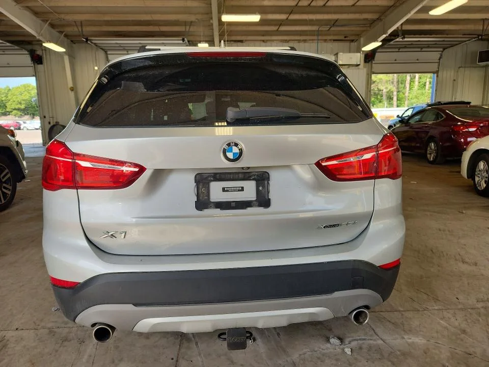 WBXHT3C34J5L33469 — 2018 BMW X1 photo 6