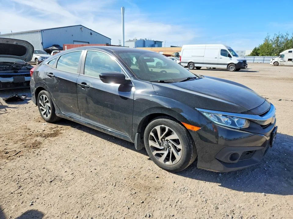 2HGFC2F62JH011735 — 2018 HONDA CIVIC photo 4