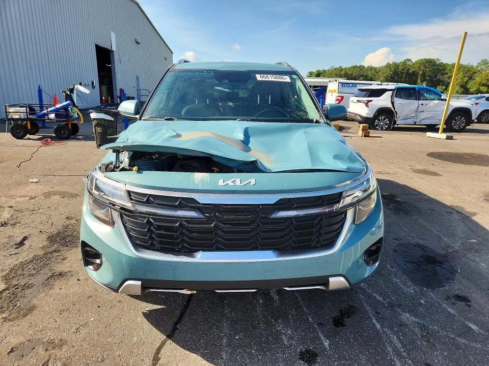 KNDER2AAXR7484648 — 2024 KIA SELTOS photo 5