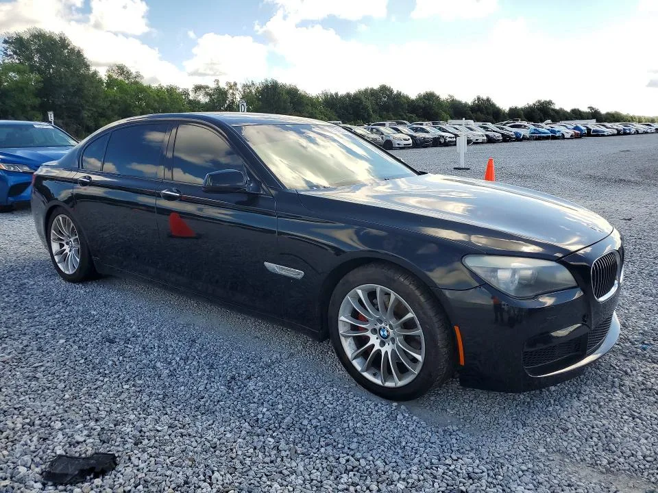 WBAKB4C51CC575371 — 2012 BMW 740 photo 4