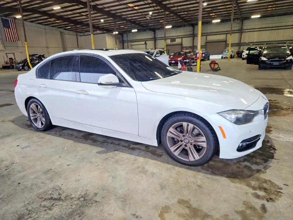 WBA8E9G59GNT43586 — 2016 BMW 328 photo 4