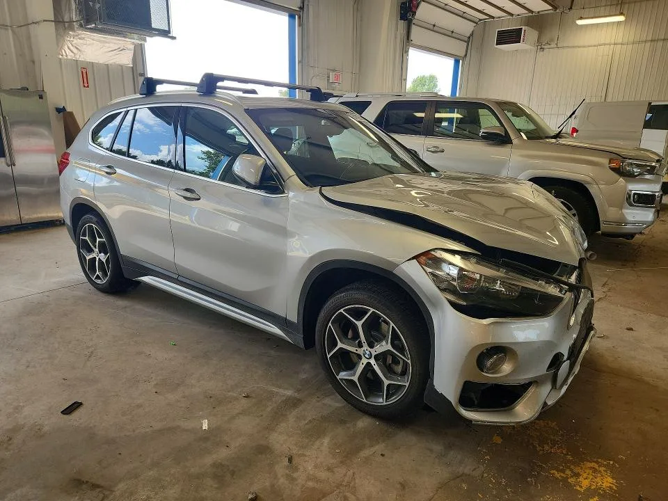 WBXHT3C34J5L33469 — 2018 BMW X1 photo 4
