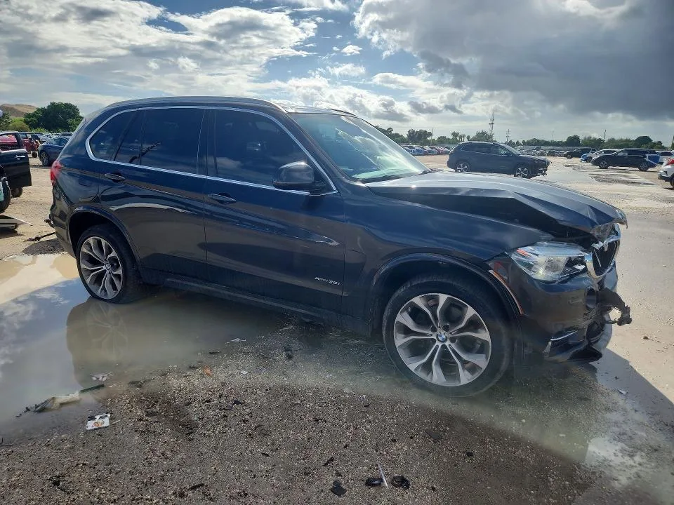 5UXKR0C36H0X80438 — 2017 BMW X5 photo 4