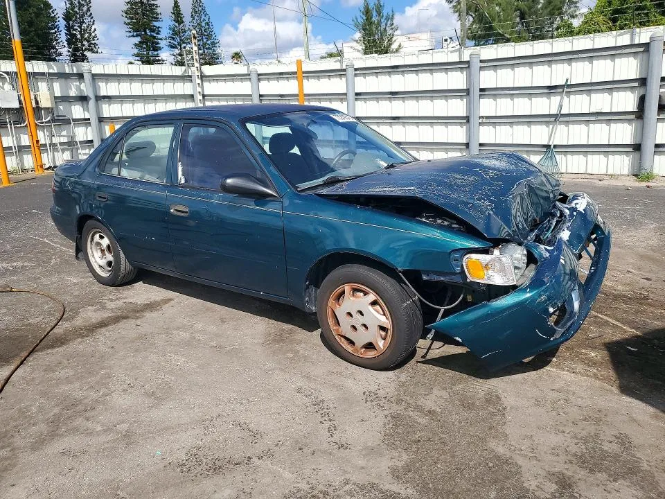 1NXBR12E82Z634175 — 2002 TOYOTA COROLLA photo 4