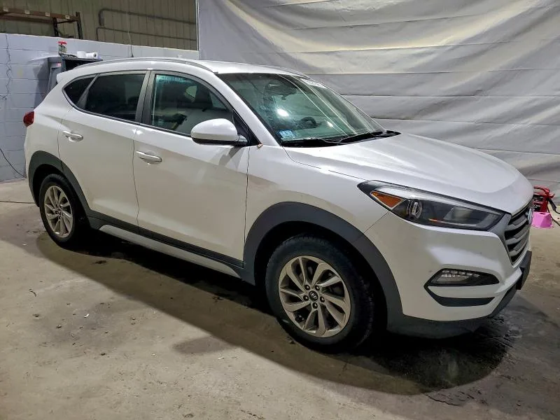 KM8J3CA41JU684688 — 2018 HYUNDAI TUCSON photo 4