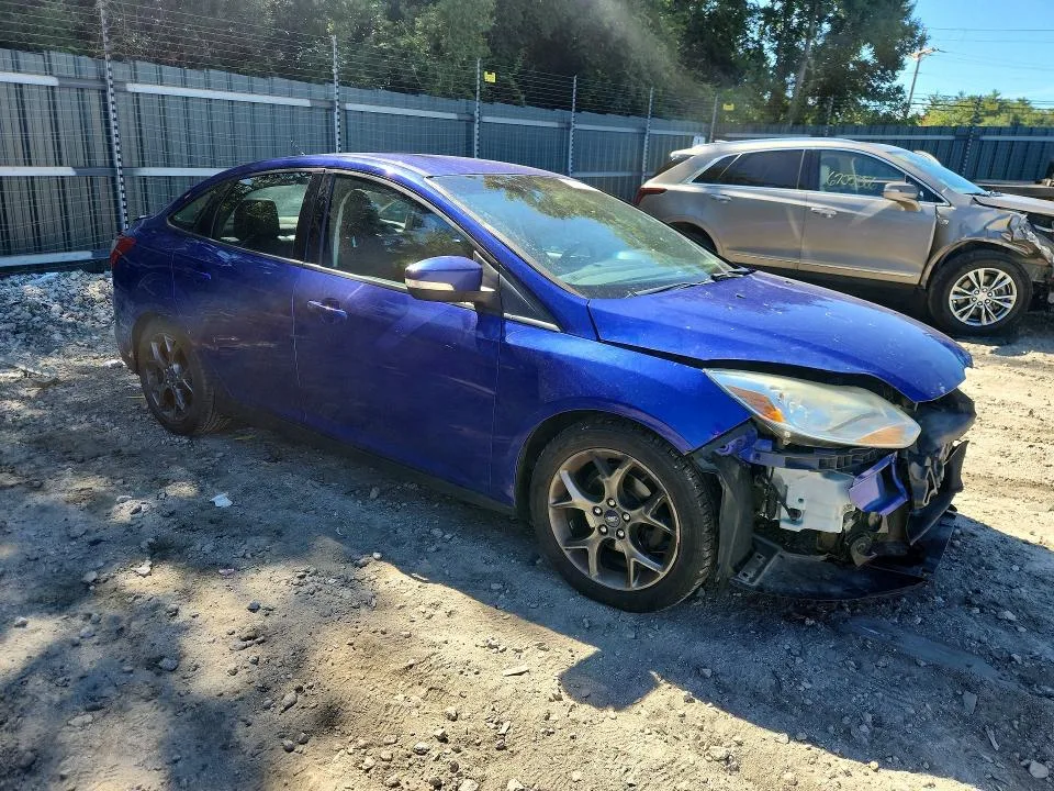 1FADP3F26EL306977 — 2014 FORD FOCUS photo 4