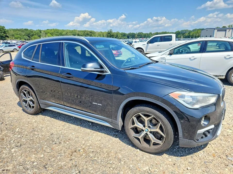 WBXHT3Z39H4A65769 — 2017 BMW X1 photo 4
