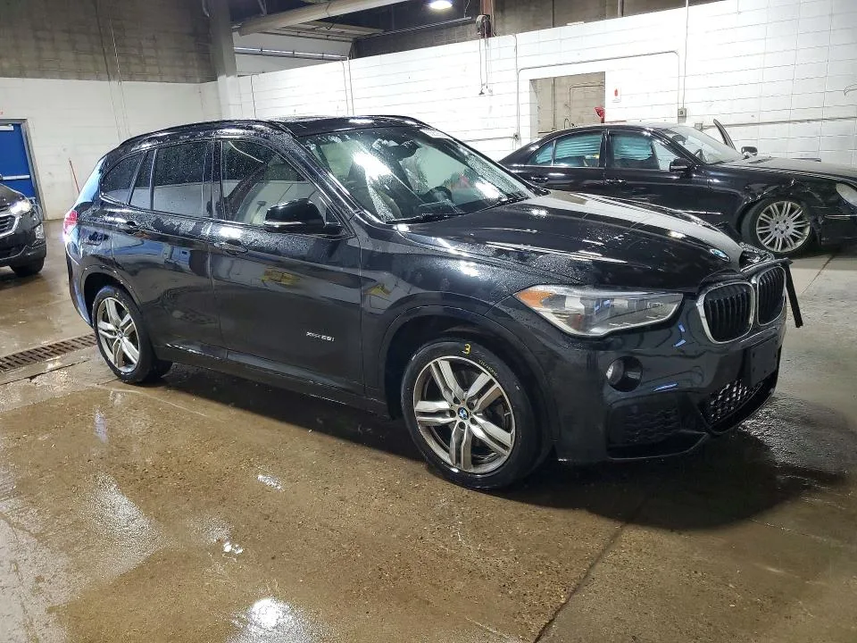 WBXHT3C30H5F75589 — 2017 BMW X1 photo 4