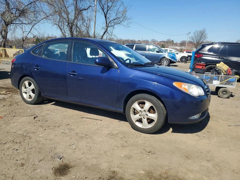 KMHDU4AD8AU175021 — 2010 HYUNDAI ELANTRA photo 4