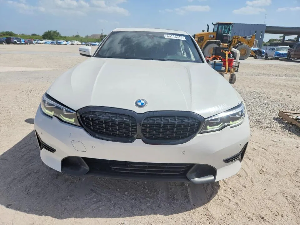 3MW5R7J06L8B23232 — 2020 BMW 330XI photo 5