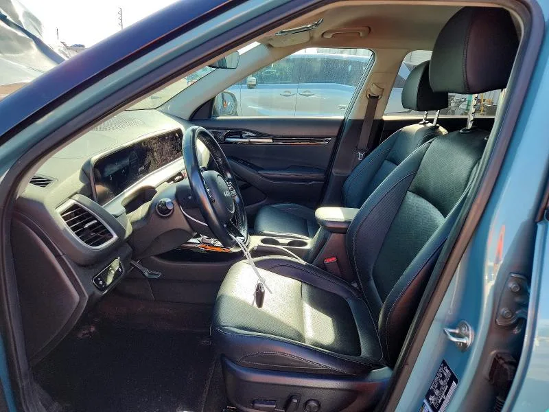 KNDER2AAXR7484648 — 2024 KIA SELTOS photo 7